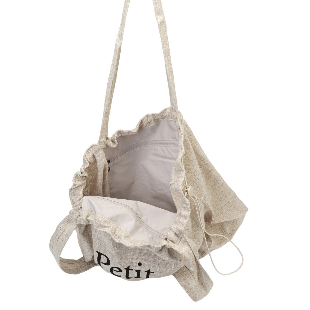 Oversized linnen trekkoord‑shopper “Petit à petit.”
